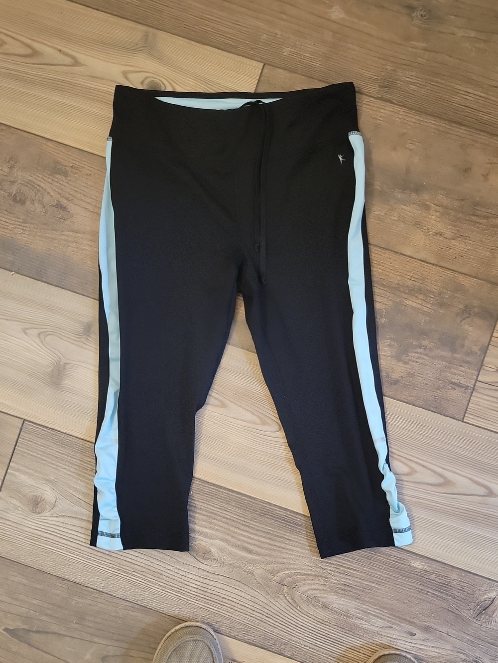 Danskin Black Capri Leggings with Light Blue Side Stripes